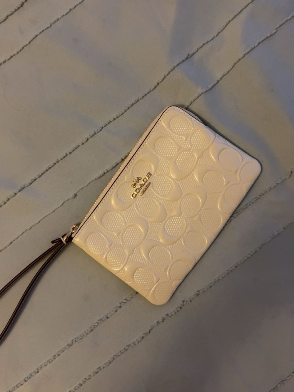 Coach Cream Embossed Signature Zip Wristlet with Gold Hardware